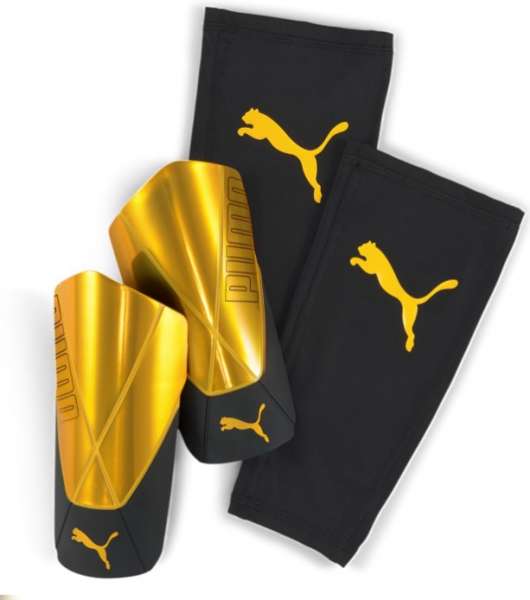 Puma ftblNXT Schienbeinschoner gold/schwarz